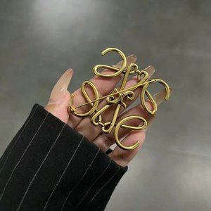 Loewe gold brooch